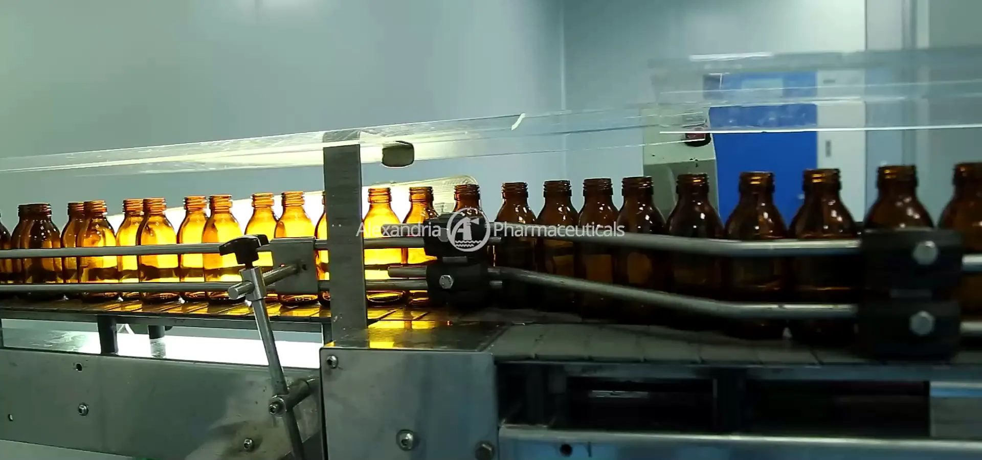 Syrup bottles on the filling line